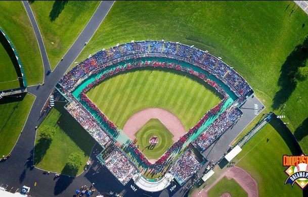 Aerial view of Cooperstown Dreams Park stadium packed with teams during tournament